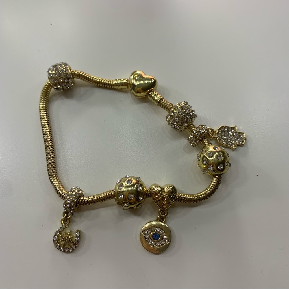 Gold charm bracelet